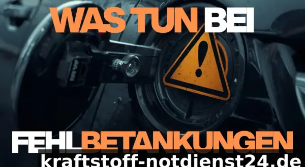 Tankklappe eines Autos mit Warnsymbol und Text "WAS TUN BEI FEHLBETANKUNGEN".